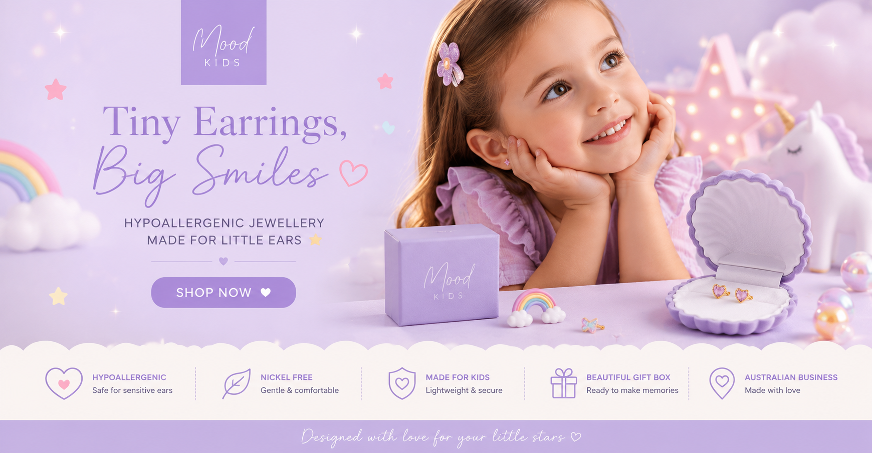 A promotional banner for Mood Kids hypoallergenic baby and toddler earrings. A young girl with a purple bow in her hair is shown smiling next to an open purple shell-shaped jewelry box containing lavender earrings, with a matching purple jewelry box in front of her.